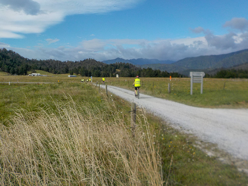 Cycling around quiet Golden Bay farmland Top of the South Island