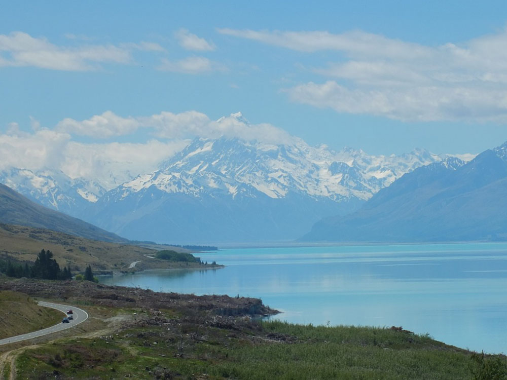 Mt Cook beside blue lake on our private tour