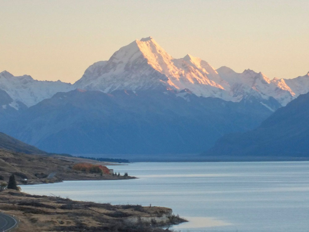 View looking over Lake Pukaki towards Mt Cook covered in winter snow